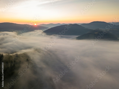 Morning fog in the Ukrainian Carpathians. Aerial drone view.