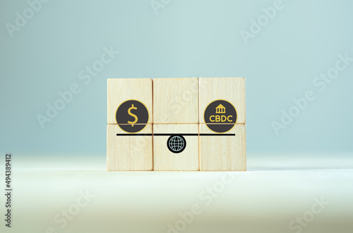 CBDC Central Bank Digital Currency. Financial technology,blockchain, matchine learning, exchange, money and digital asset. Modern banking cryptocurrency blockchain technology. Wooden cubes background. photo