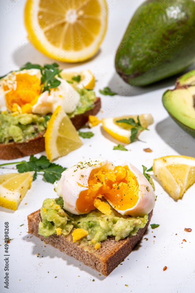 Healthy diet sandwiches for breakfast, snack. Toast with guacamole avocado salsa and poached egg Healthy diet sandwiches for breakfast, snack. Toast with guacamole avocado salsa and poached egg