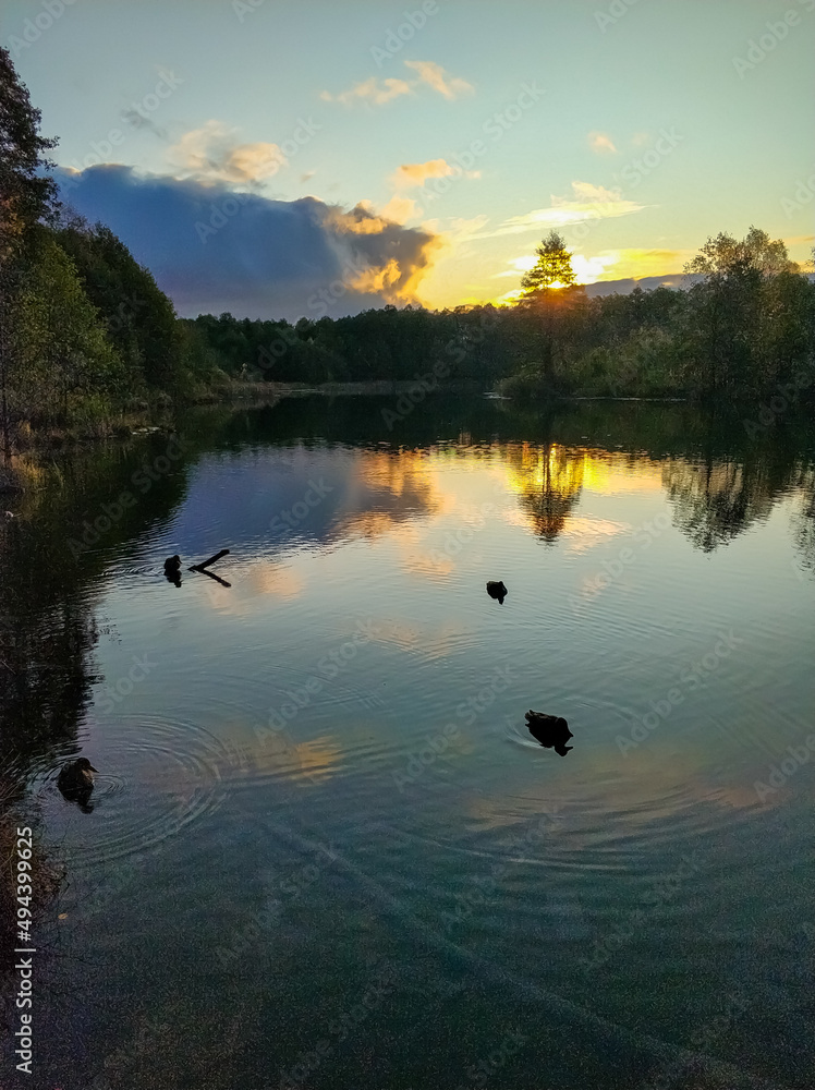 Dawn of the sun on a blue lake in Kazan. Dawn of the sun on a blue lake in Kazan.