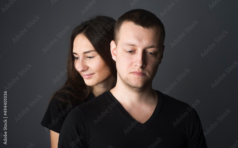
close-up portrait of a pair of beautiful young guys and girls with a range of emotions and views on a dark background