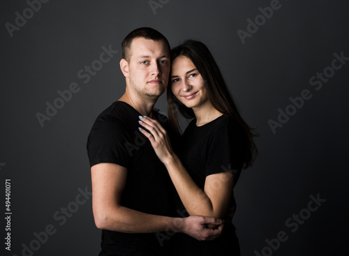  close-up portrait of a pair of beautiful young guys and girls with a range of emotions and views on a dark background