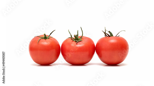 Red tomato on a white background. For grocery stores.
