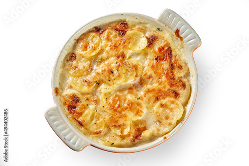 Appetizing potato gratin in casserole on table