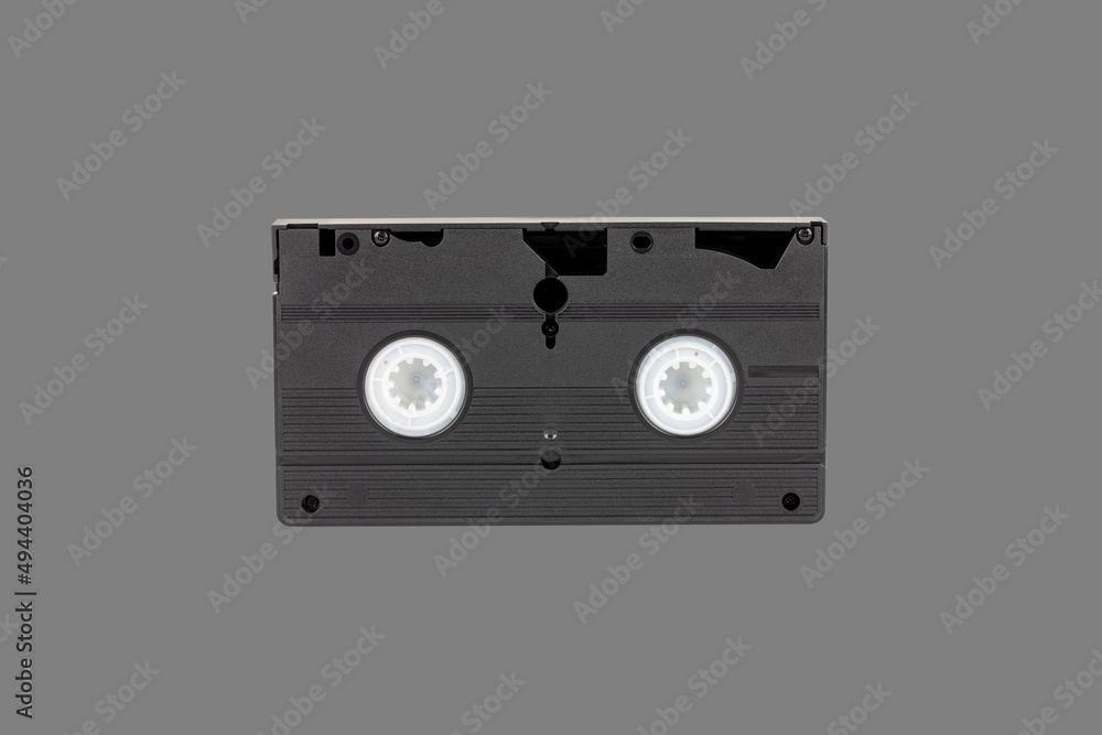 Fototapeta premium VHS videotape is isolated on a gray background rear view