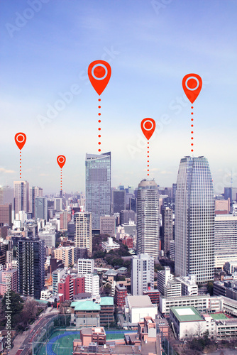 Network connection concept. Aerial view on Tokyo with location pin