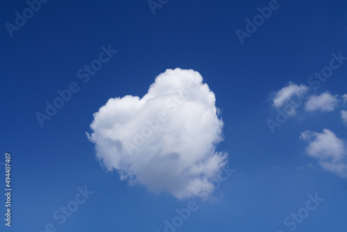 Heartshaped white clear cloud with blue sky  photo