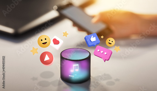 Fototapeta Naklejka Na Ścianę i Meble -  social media, ai and technology concept - smart speaker with virtual music note hologram on table at office over internet icons