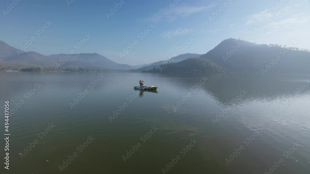 Enjoy city break alone relax rural river life on beauty fog paddling OAR rowing on calm aqua sport outside. Active solo serene people wide drone view happy get away escape summer nautical vessel trip. Enjoy city break alone relax rural river life on beauty fog paddling OAR rowing on calm aqua sport outside. Active solo serene people wide drone view happy get away escape summer nautical vessel trip.