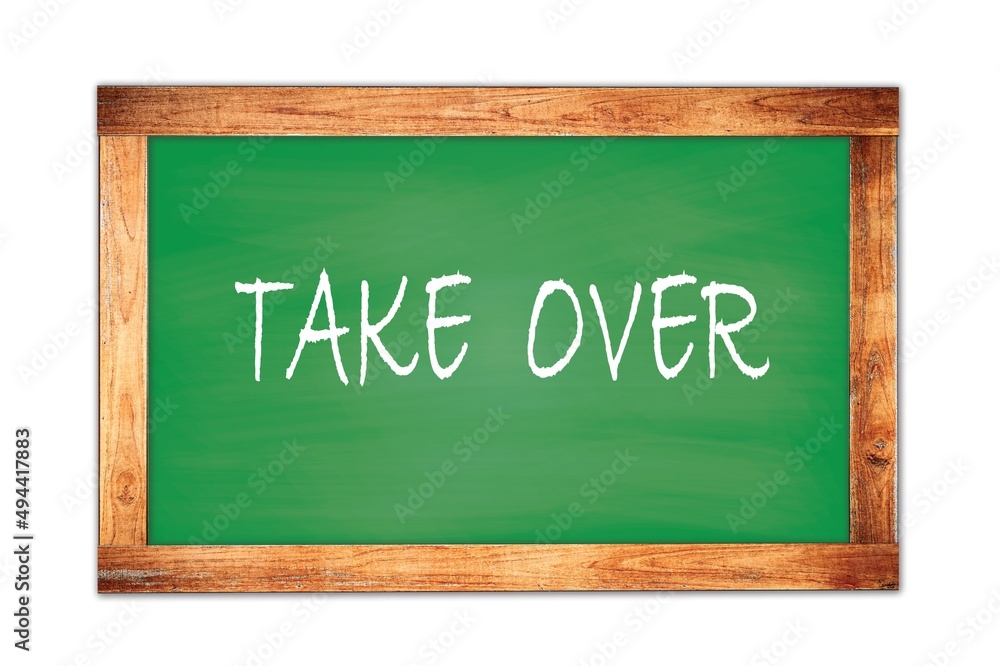 TAKE OVER text written on green school board. TAKE OVER text written on green school board.