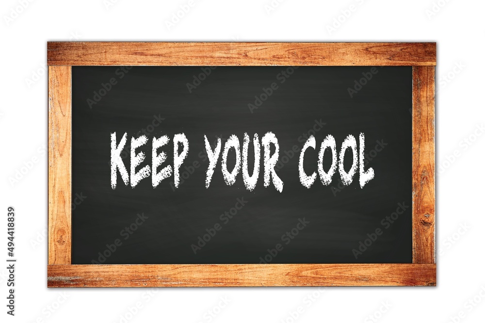 KEEP YOUR COOL text written on wooden frame school blackboard. KEEP YOUR COOL text written on wooden frame school blackboard.