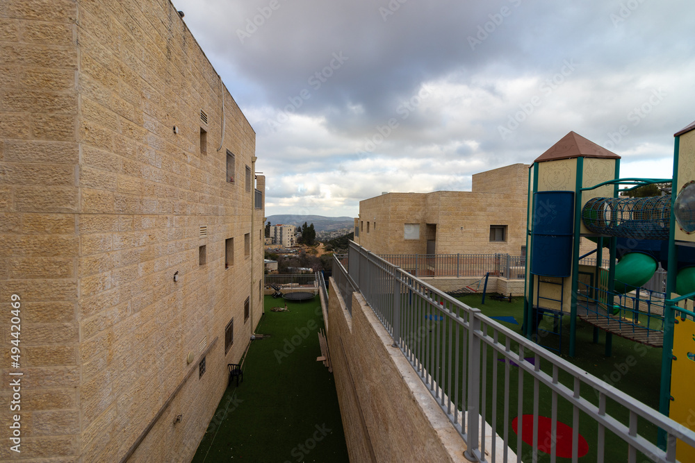 Houses and buildings in Beit El in Samaria-Israel. Cloudy skies of winter Houses and buildings in Beit El in Samaria-Israel. Cloudy skies of winter