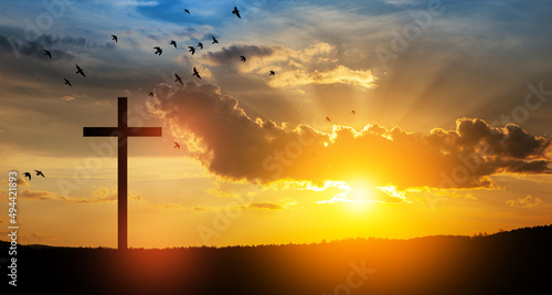 Billede på lærred Christian cross on hill outdoors at sunrise