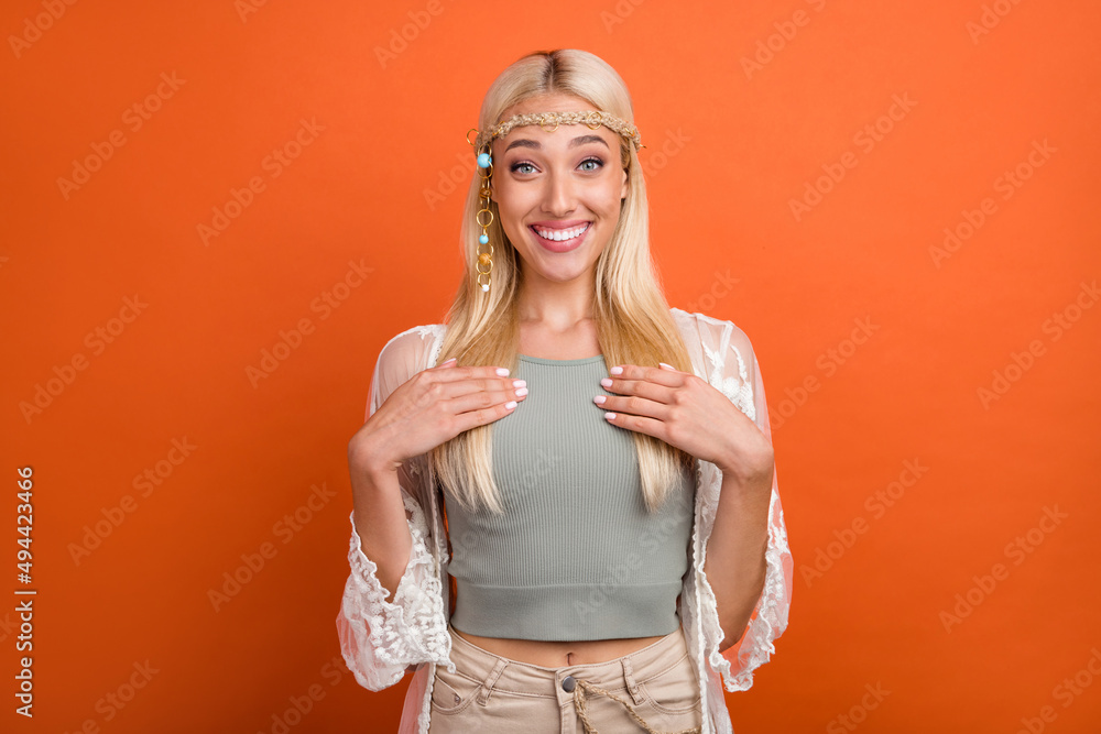 Portrait of attractive cheerful funny girly girl choose me reaction isolated over vivid orange color background Portrait of attractive cheerful funny girly girl choose me reaction isolated over vivid orange color background