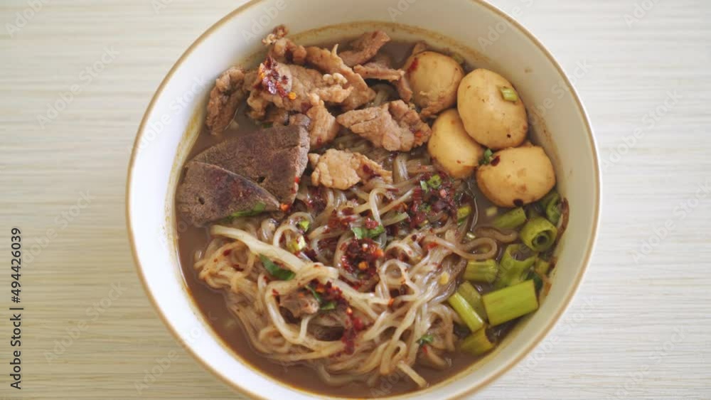 Thai noodle with pork, stewed pork, meatball and pork liver in blood soup - Thai noodles style Thai noodle with pork, stewed pork, meatball and pork liver in blood soup - Thai noodles style
