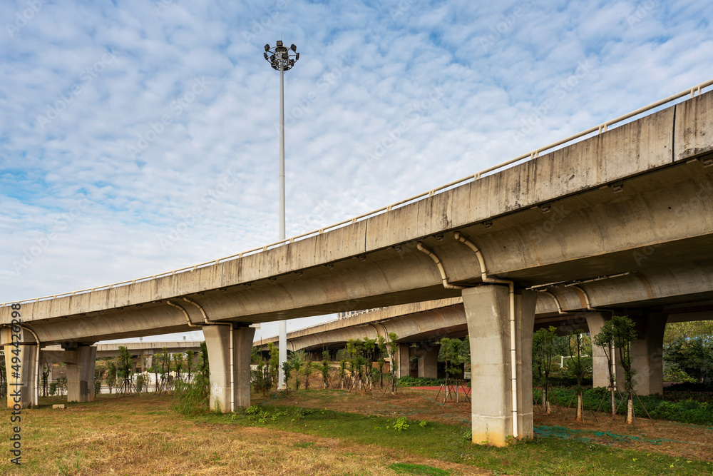 Grass under the overpass,Freeway, overpass and junction with green grass