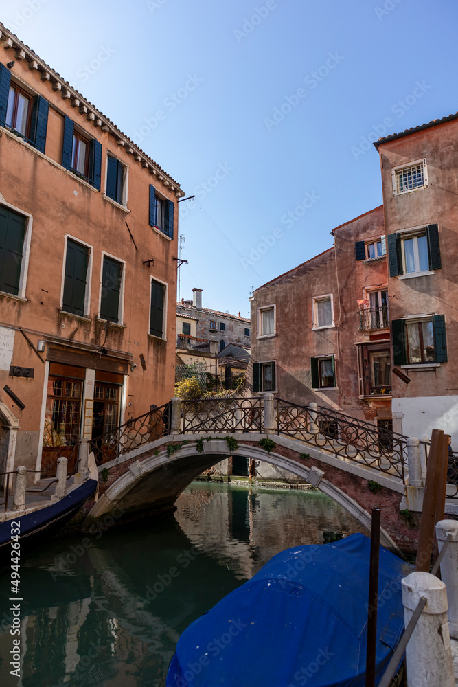 Canals, bridges and buildings in the city of Venice Italy. classic buildings, blue water canals.