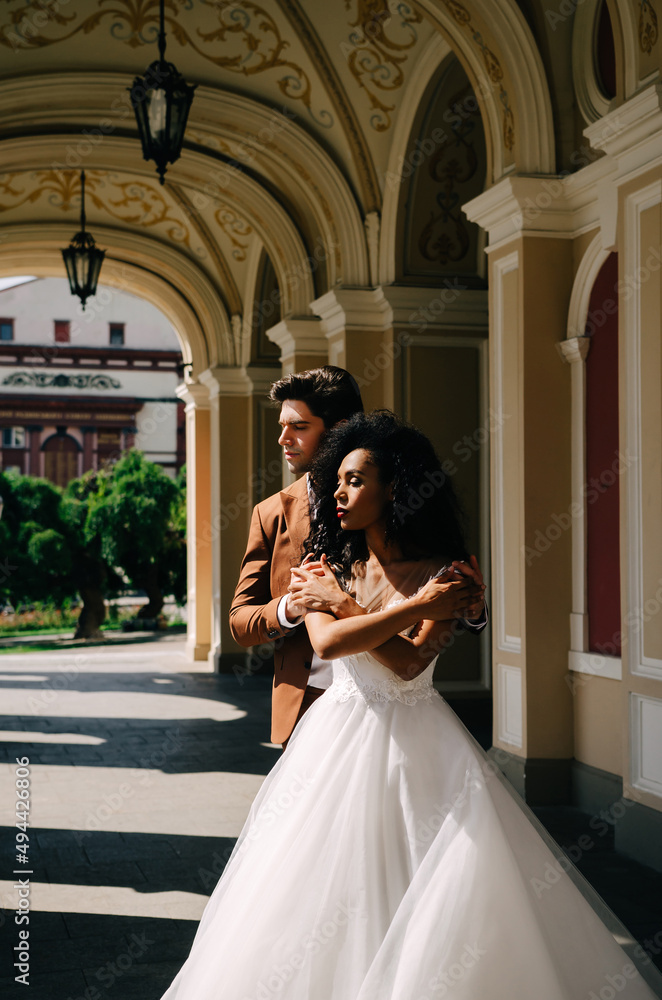 Beautiful African American girl in wight dress with her husband Beautiful African American girl in wight dress with her husband