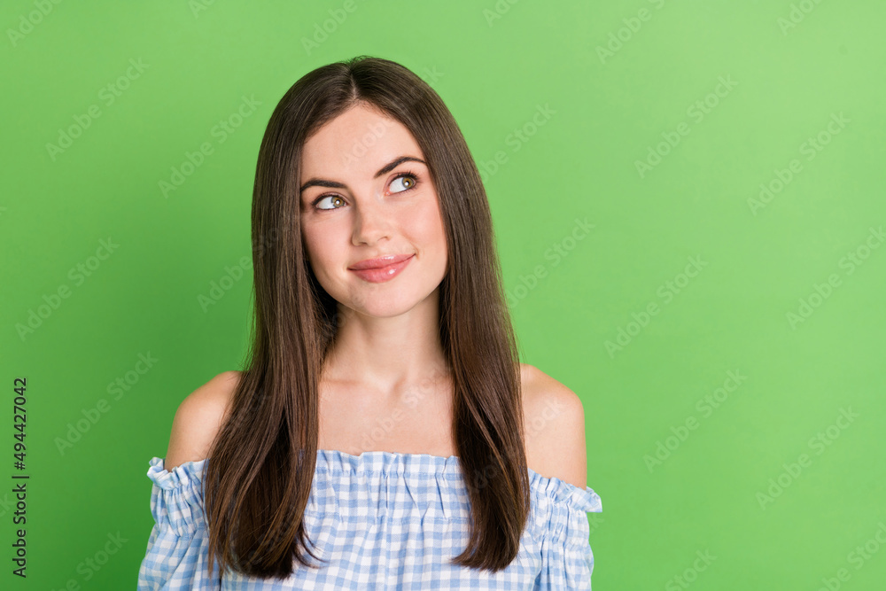 Portrait of sweet good looking lady look empty space daydreaming relaxing on vacation isolated on green color background Portrait of sweet good looking lady look empty space daydreaming relaxing on vacation isolated on green color background