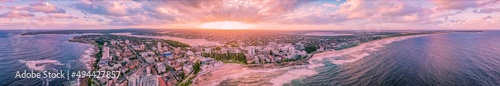 Panoramic aerial drone view of Cronulla in the Sutherland Shire, South Sydney, in the late afternoon with a sunset    photo