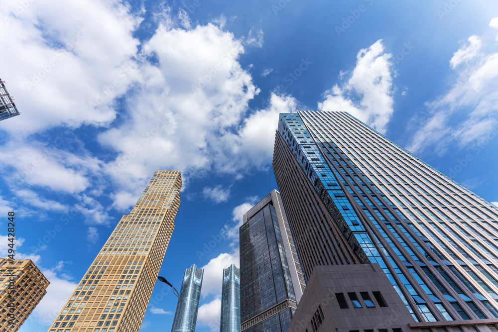 Looking up at modern buildings in Shanghai