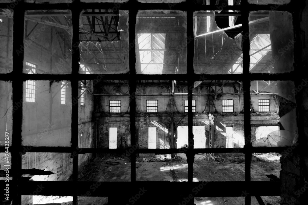 Broken windows inside the hall after the war in Serbia Broken windows inside the hall after the war in Serbia
