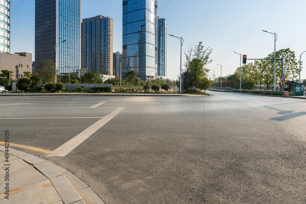 Empty urban road and buildings in the city Empty urban road and buildings in the city