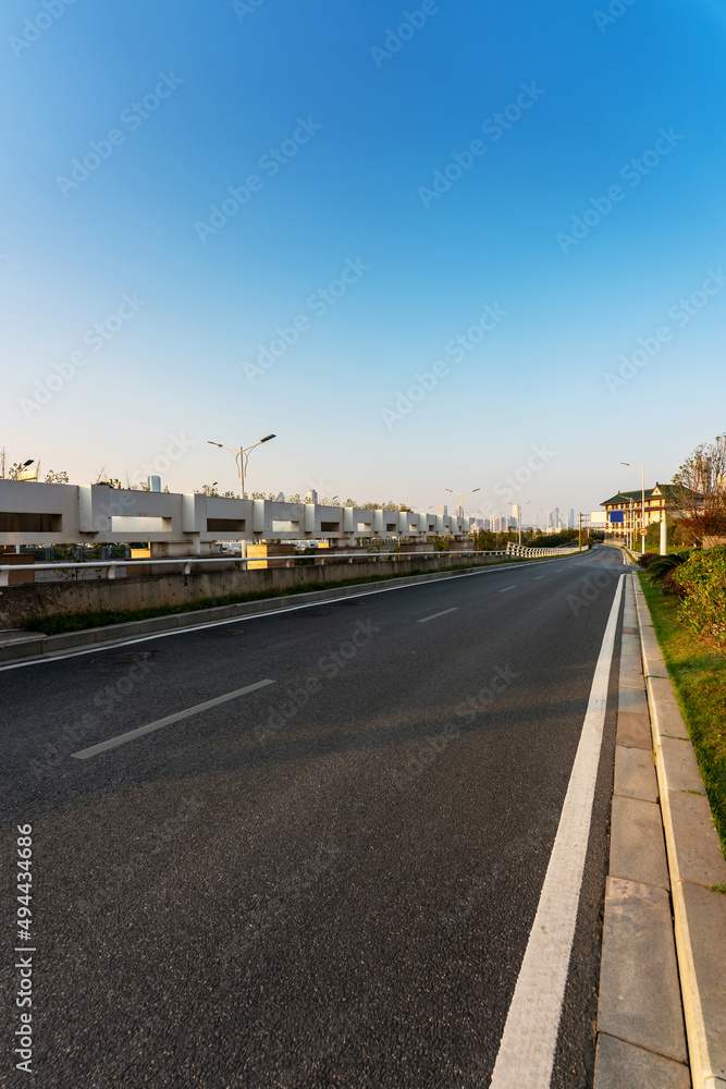 Empty urban road and buildings in the city Empty urban road and buildings in the city
