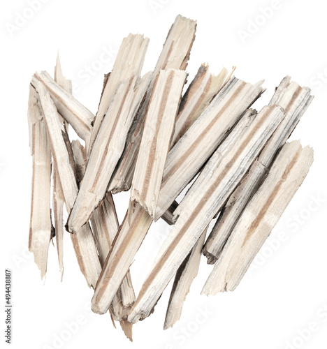 Dry tree twigs branches isolated on white background. pieces of broken wood plank. small wood chips close-up