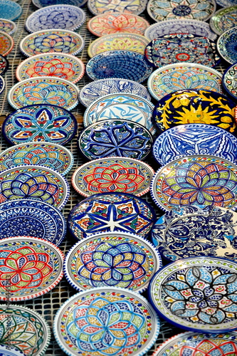 Traditional moroccan pottery and kitchenware on display for tourists