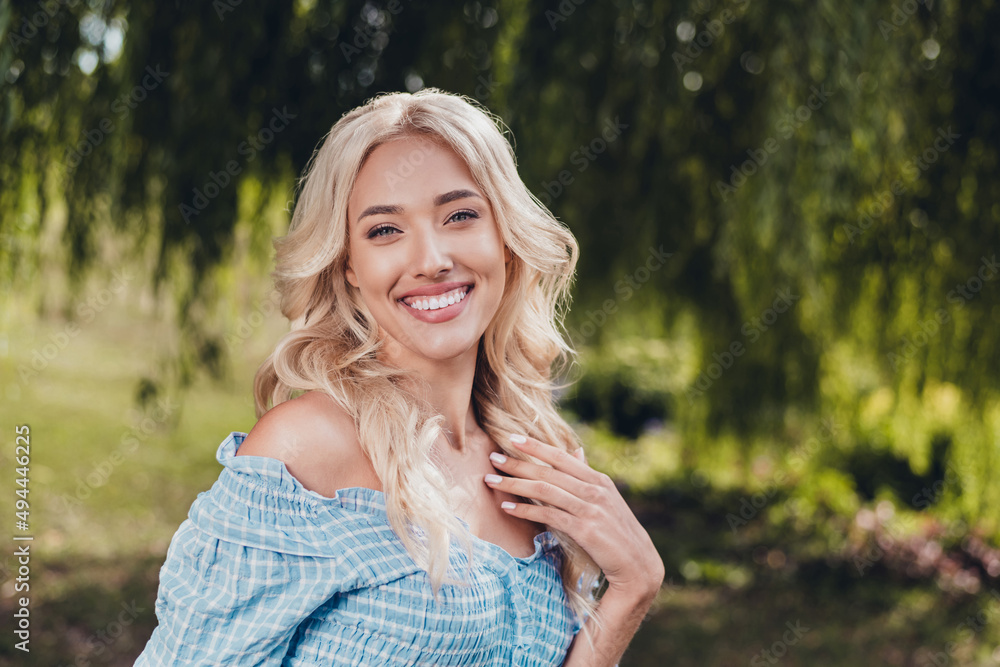 Portrait of attractive cheerful wavy-haired girl enjoying good weather going for a walk garden outside outdoors Portrait of attractive cheerful wavy-haired girl enjoying good weather going for a walk garden outside outdoors