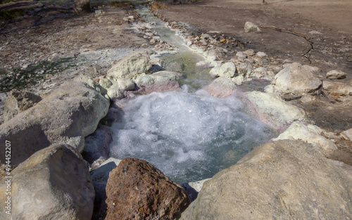 Pool of sulphurous water in The park of the Mola,Oriolo Romano.Sprays of water spewed out of the sulfur pool.One of the ancient volcanic part of Lazio - it is a thermal spring (t = 25-28 ° C) 