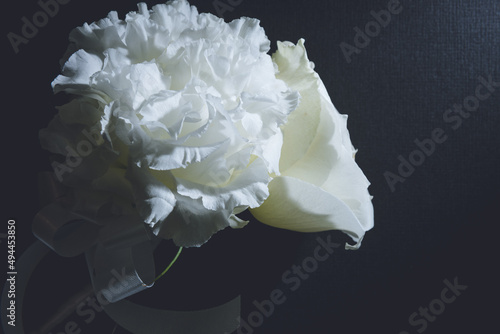 white flower closeup, wedding bouquet on dark background, wedding ceremony