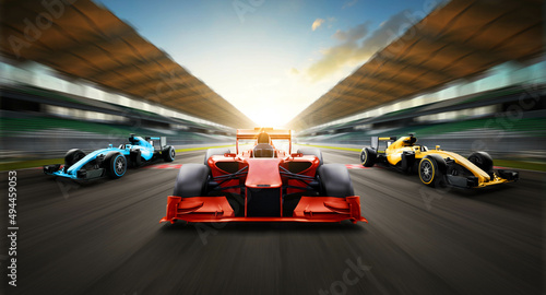 Race car racing on speed track, Car race on asphalt road race track crossing start and finish line with motion blur background. 3D Rendering. photo