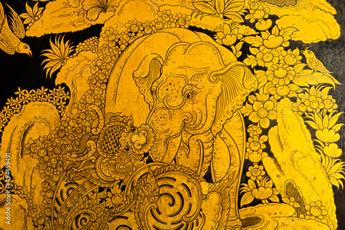 pattern in traditional Thai style art painting on window of the temple