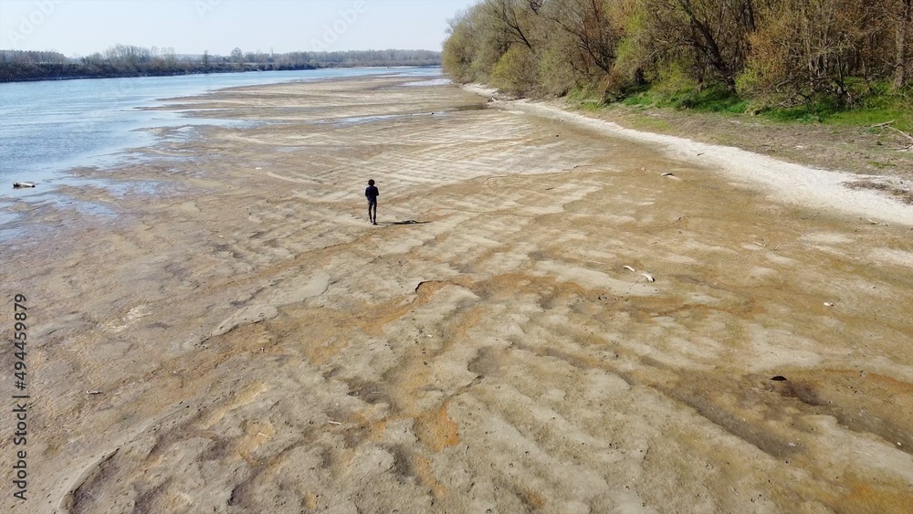 problems of drought and aridity in the almost waterless Po river with large  expanses of sand