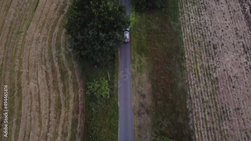 Marvelous aerial flight drone shot from above chasing a car at sunsetin nature reserve Müritz Seen Park Mecklenburg Brandenburg Germany Aerial drone view. Cinematic nature photo