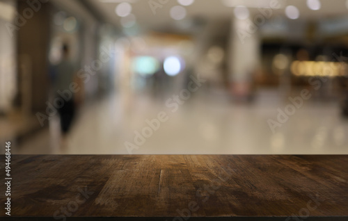 Wallpaper Mural Wood table top in front of abstract blurred background. Empty wooden table space for text marketing promotion. blank wood table surface copy space Torontodigital.ca