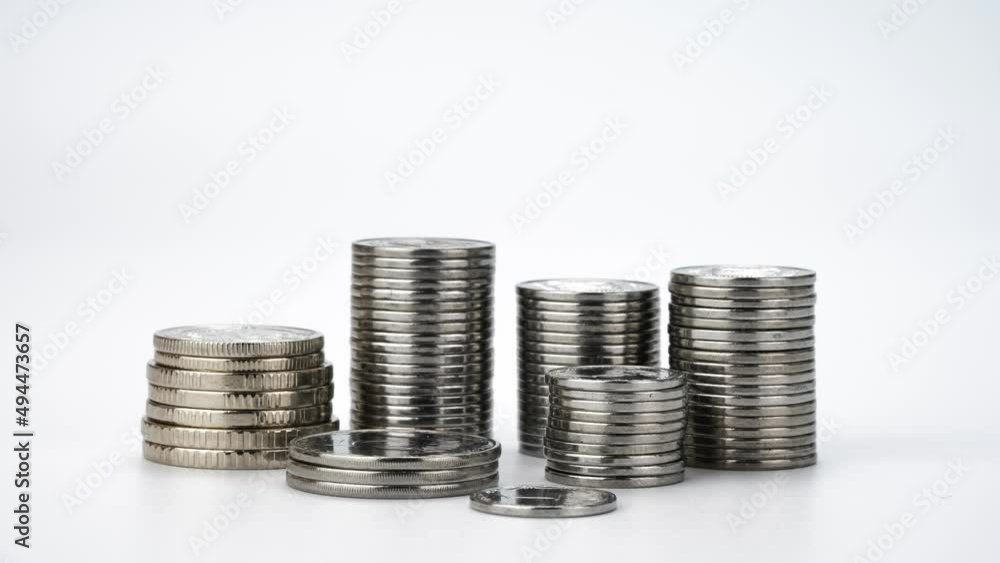 Decreasing Stacks of Coins. Coins Disappearing One By One. Money Saving and Economy Concept. Stop Motion Animation Decreasing Stacks of Coins. Coins Disappearing One By One. Money Saving and Economy Concept. Stop Motion Animation