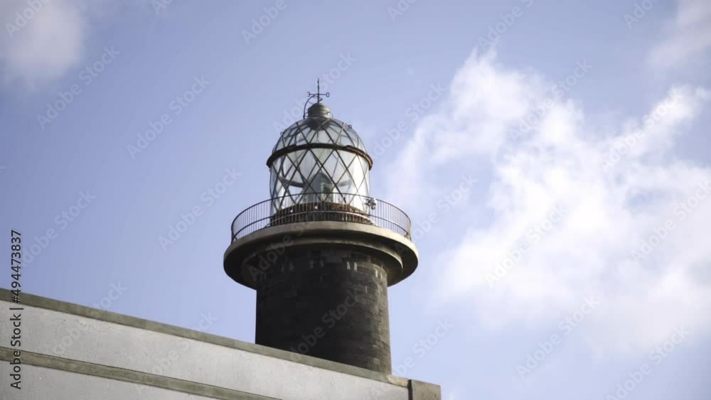 lighthouse standing against blue clear sky in canary island Spain lighthouse standing against blue clear sky in canary island Spain
