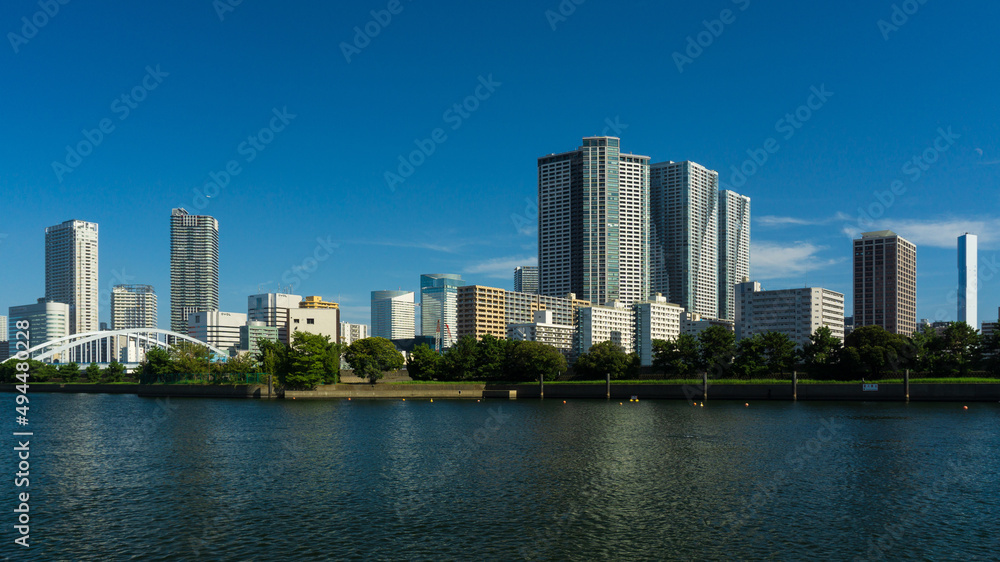 Tokyo's cityscape from Hamarikyu Park in the business district of the city.