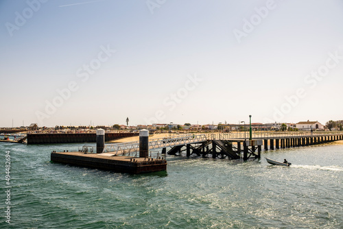 Pier and beach on Culatra Island, Faro, Algarve, Portugal