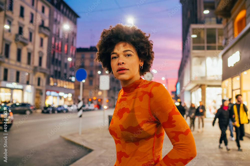 Young mixed race woman outdoor posing outdoor