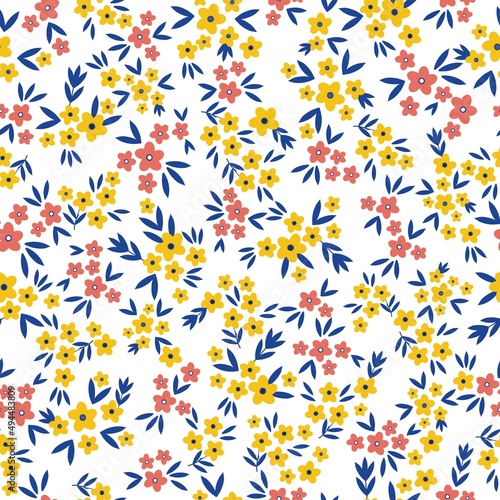 Seamless vintage pattern. Small yellow and pink flowers, blue leaves. white background. vector texture. fashionable print for textiles, wallpaper and packaging. © Алена Шенбель