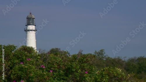 Wallpaper Mural Classic lighthouse in Maine. Wide shot of lighthouse surrounded by trees. Torontodigital.ca