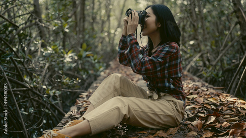 Asian women traveling in tropical forests