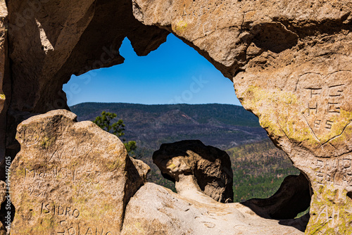 Initials written in the rock arch on top of Stable Mesa in Jemez New Mexico photo