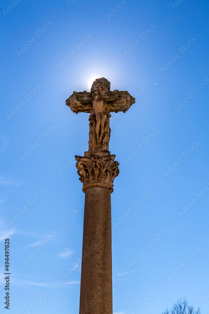 Jesus Christ on cross stone monument in Salamanca, Spain