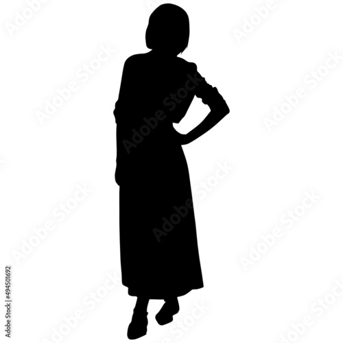 Black silhouette of slender woman with short hair in long skirt