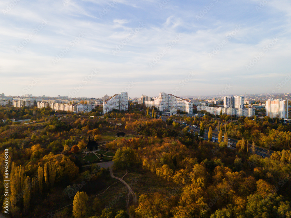 Fototapeta premium Aerial shot of Gates of the City in the Chisinau, Moldova at autumn season. Blue sky with clouds. Panoramic view of Chisinau, the capital city of the Republic of Moldova.